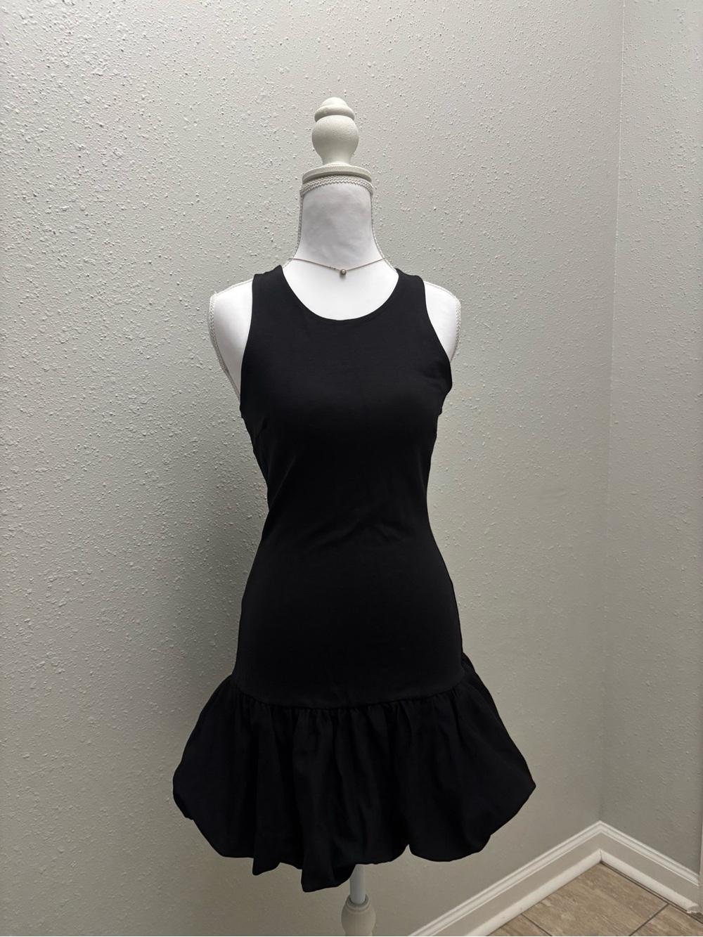 LG Black Sleeveless Ruffle-Hem Mini Dress with Scoop Neck